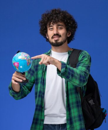 imgi_6_front-view-male-student-green-checkered-shirt-wearing-black-backpack-holding-litt imgi_6_front-view-male-student-green-checkered-shirt-wearing-black-backpack-holding-litt